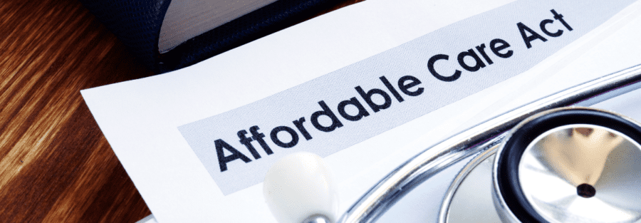 A stethoscope laying on top of a paper saying the name Affordable Care Act.