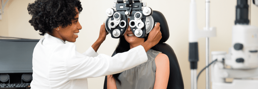 An eye doctor with a patient
