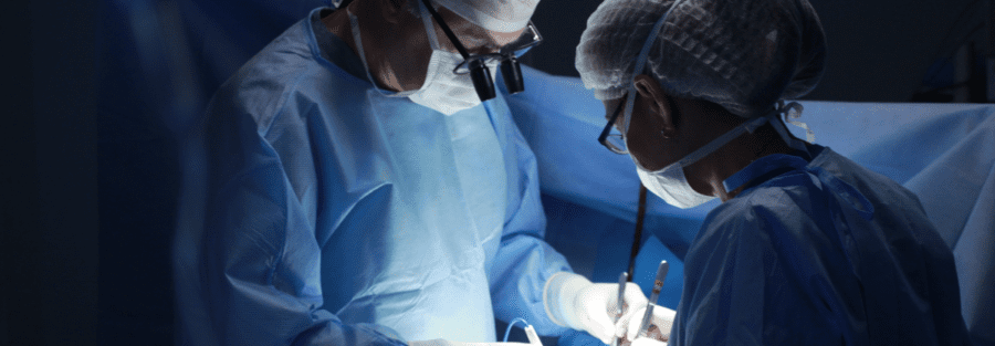 A team of surgeons operating.