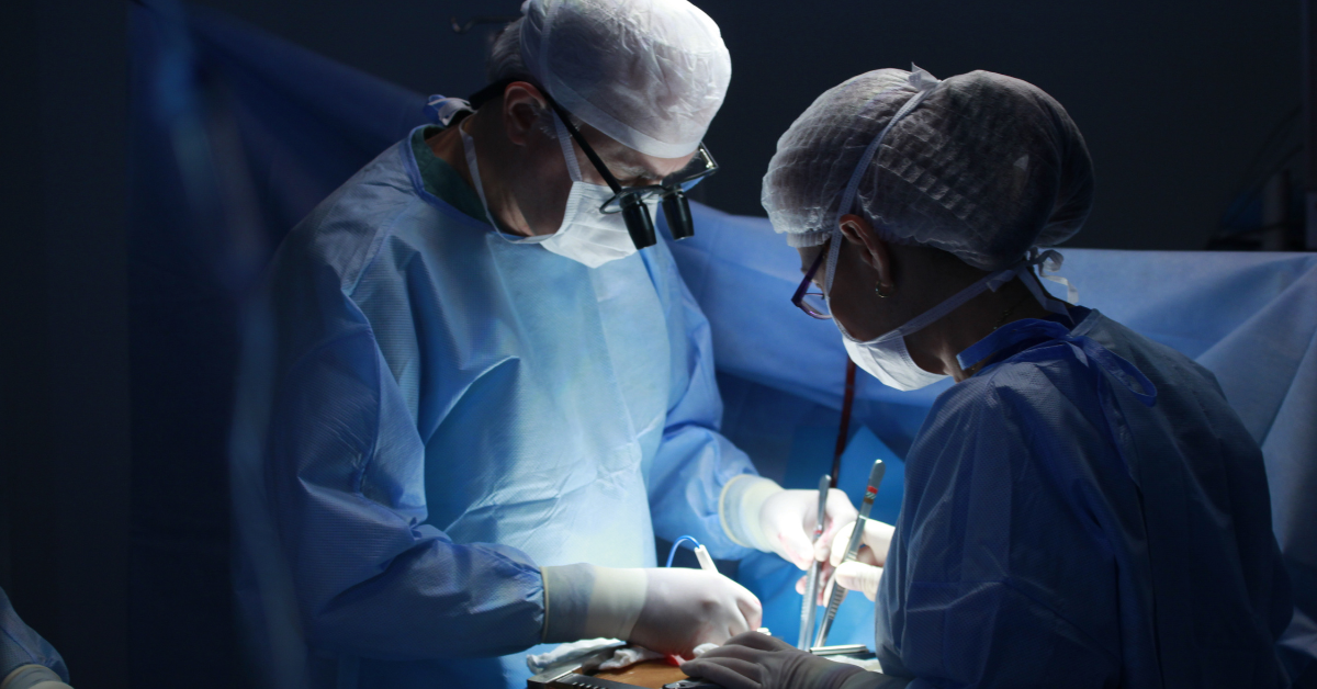 A team of surgeons operating.